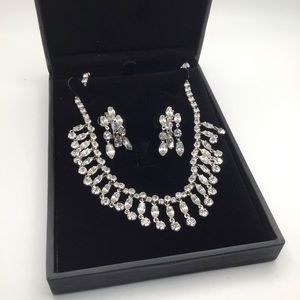 Vintage rhinestone chandelier necklace and earrings. Case included.